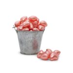 Perla de baño forma corazón rosa